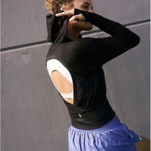 Free People Movement Love High Layer Open Back Top NWOT Women’s Size Small